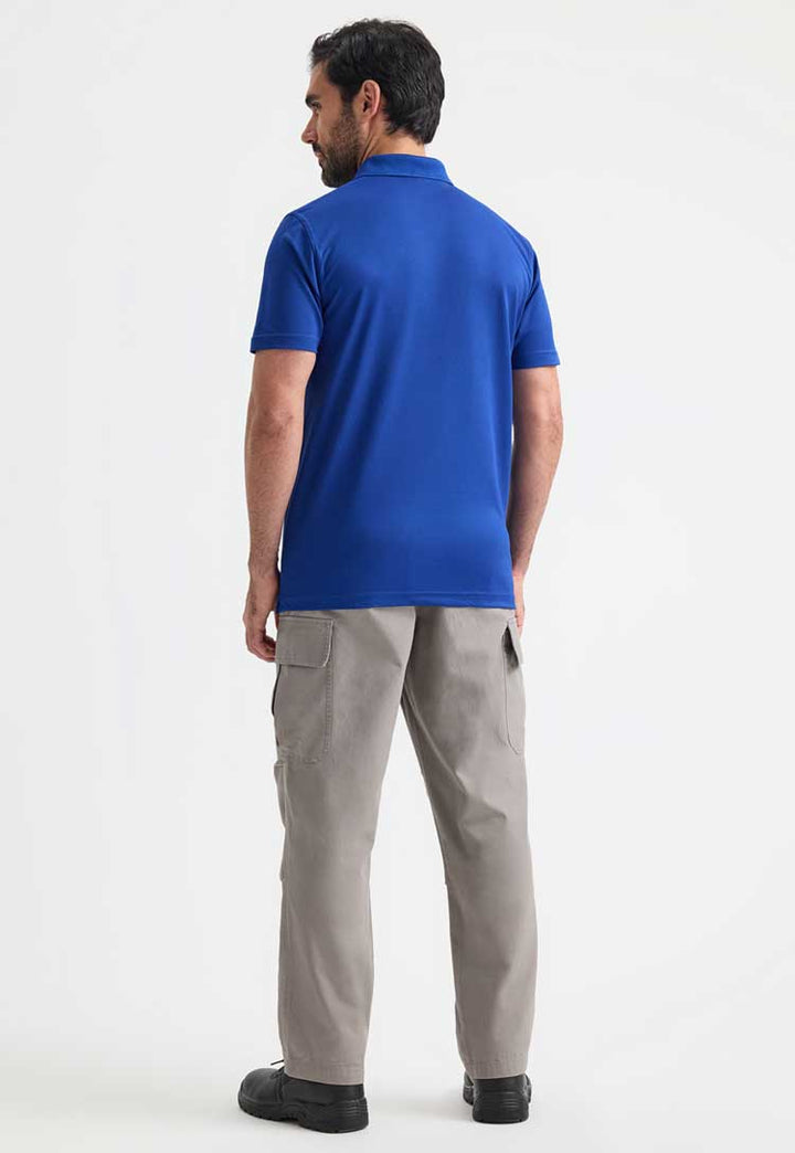 full length back view of model wearing Men's Super Cool Workwear Polo Shirt in royal blue