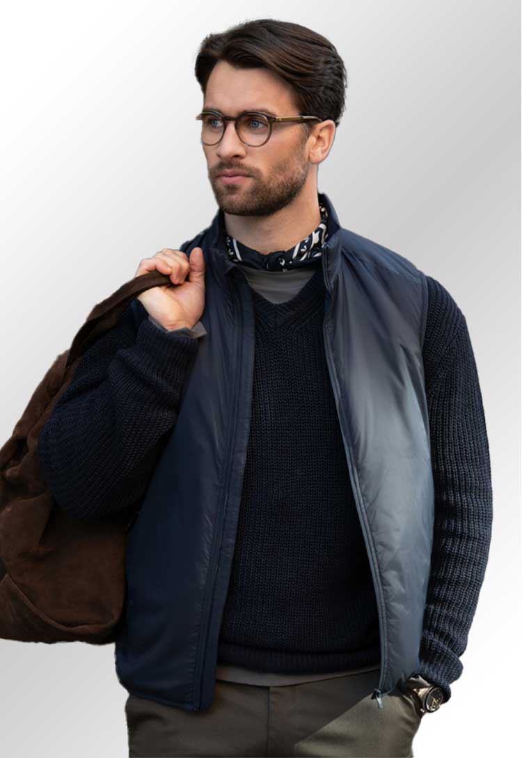 Model wearing NB128 Jasper Ultra-Lightweight Unisex Vest in Navy