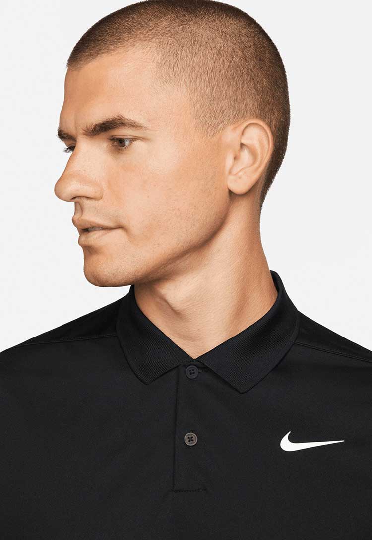 Model wearing Nike Dri-FIT Victory Solid Long Sleeve Polo NK354 close up