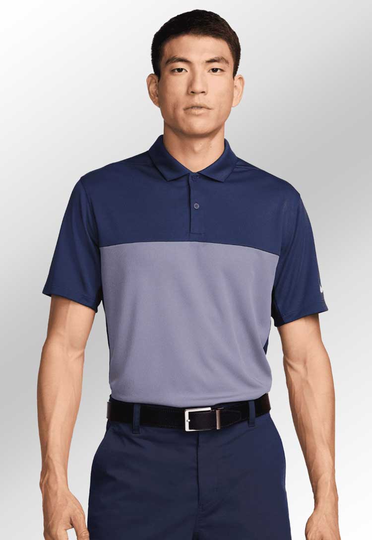 Model wearing Nike Victory+ Polo BL NK170 in navy