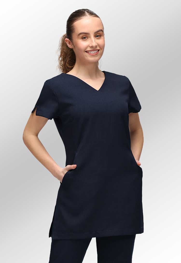 Model Wearing Nina V Neck Salon Tunic with Pockets in Light Navy