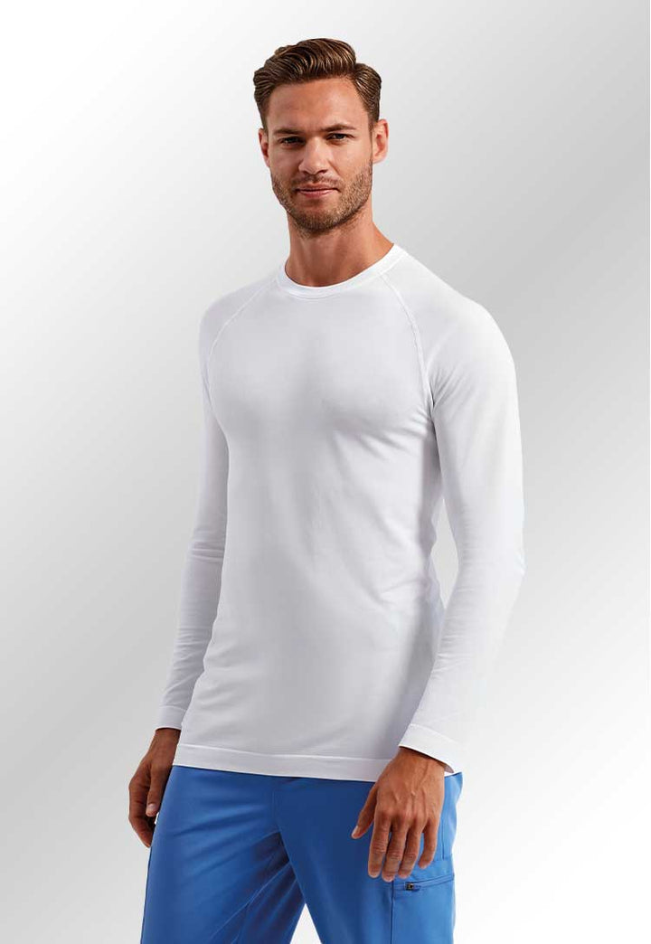 A model wearing an NN270 Unstoppable Fresh Underscrub Baselayer in White