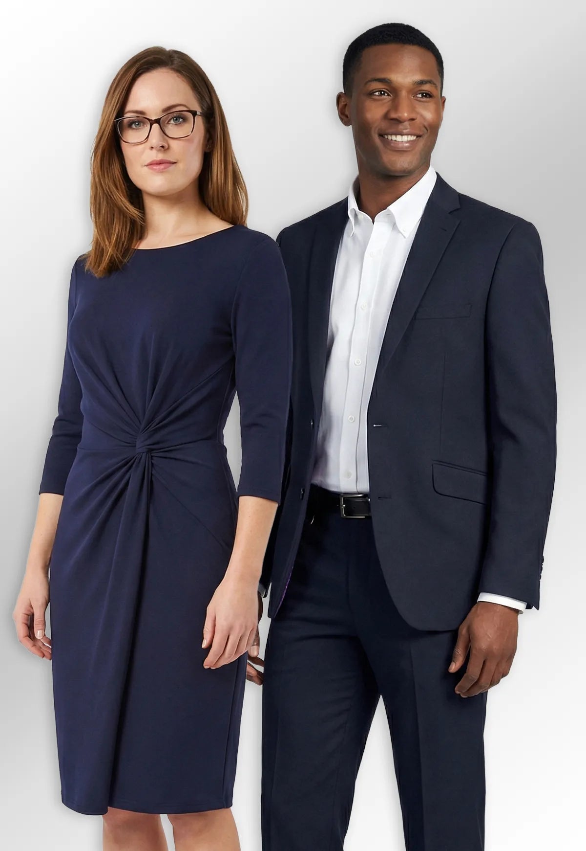 Two models wearing formal Brook Taverner suiting from the One Collection