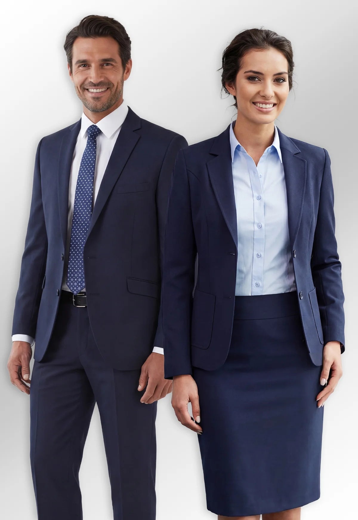 Two professionals, a woman and a man in Brook Taverner Performance Collection suits