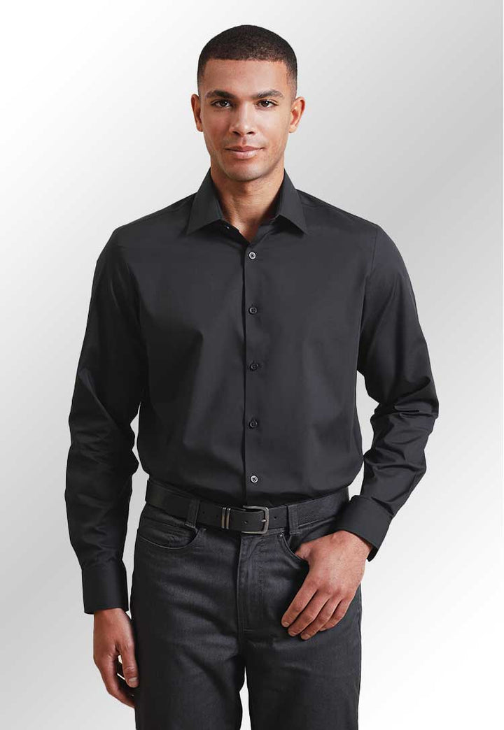 A model wearing the PR203 Recyclight Poplin Shirt in Black