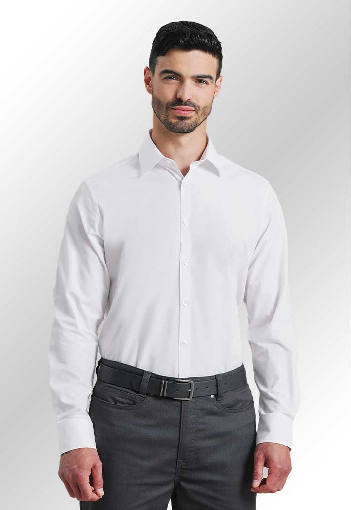 A model wearing the PR203 Recyclight Poplin Shirt in White