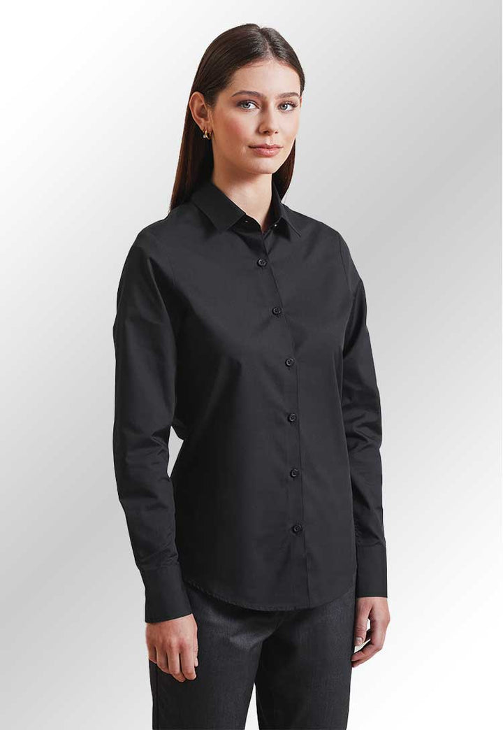 Model wearing PR303 Women's Long Sleeve 'Recyclight' Poplin Shirt in Black