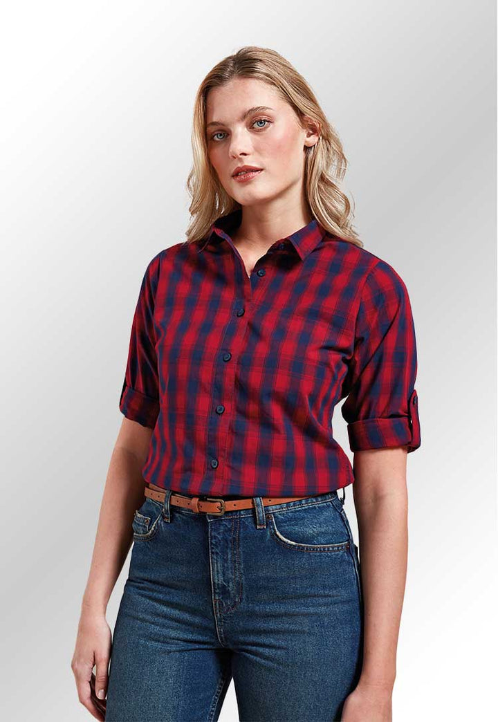 Model wearing PR350 Women's Mulligan check cotton long sleeve shirt in Red/Navy