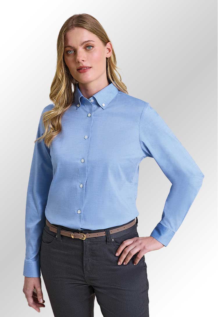 Model wearing a PR384 Women’s ‘Supreme’ Oxford long sleeve shirt in Oxford Blue