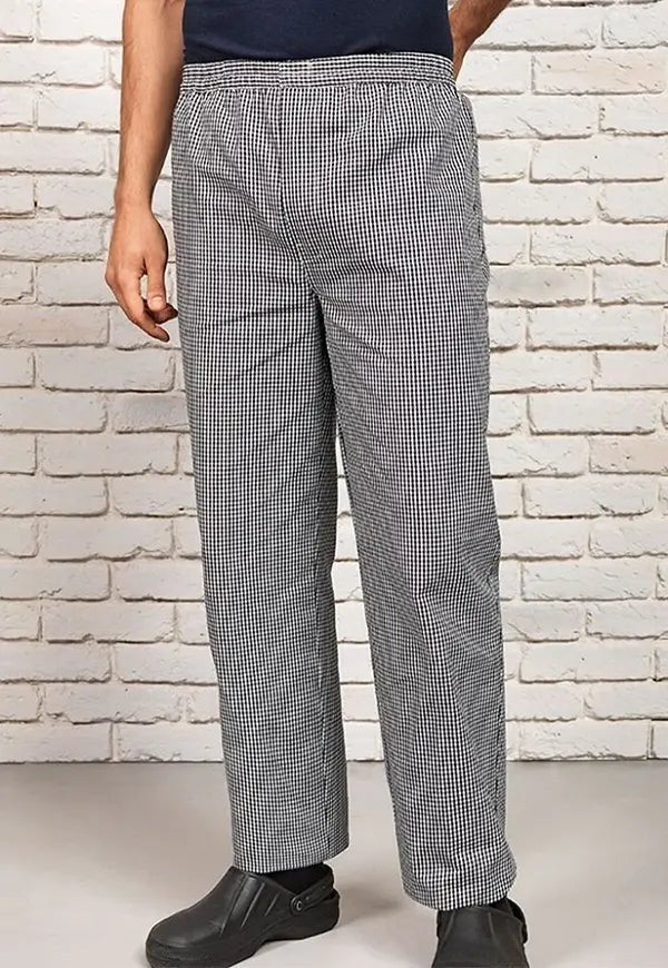 Model wearing the Pull On Chef's Trousers PR552 in Black/White Check.