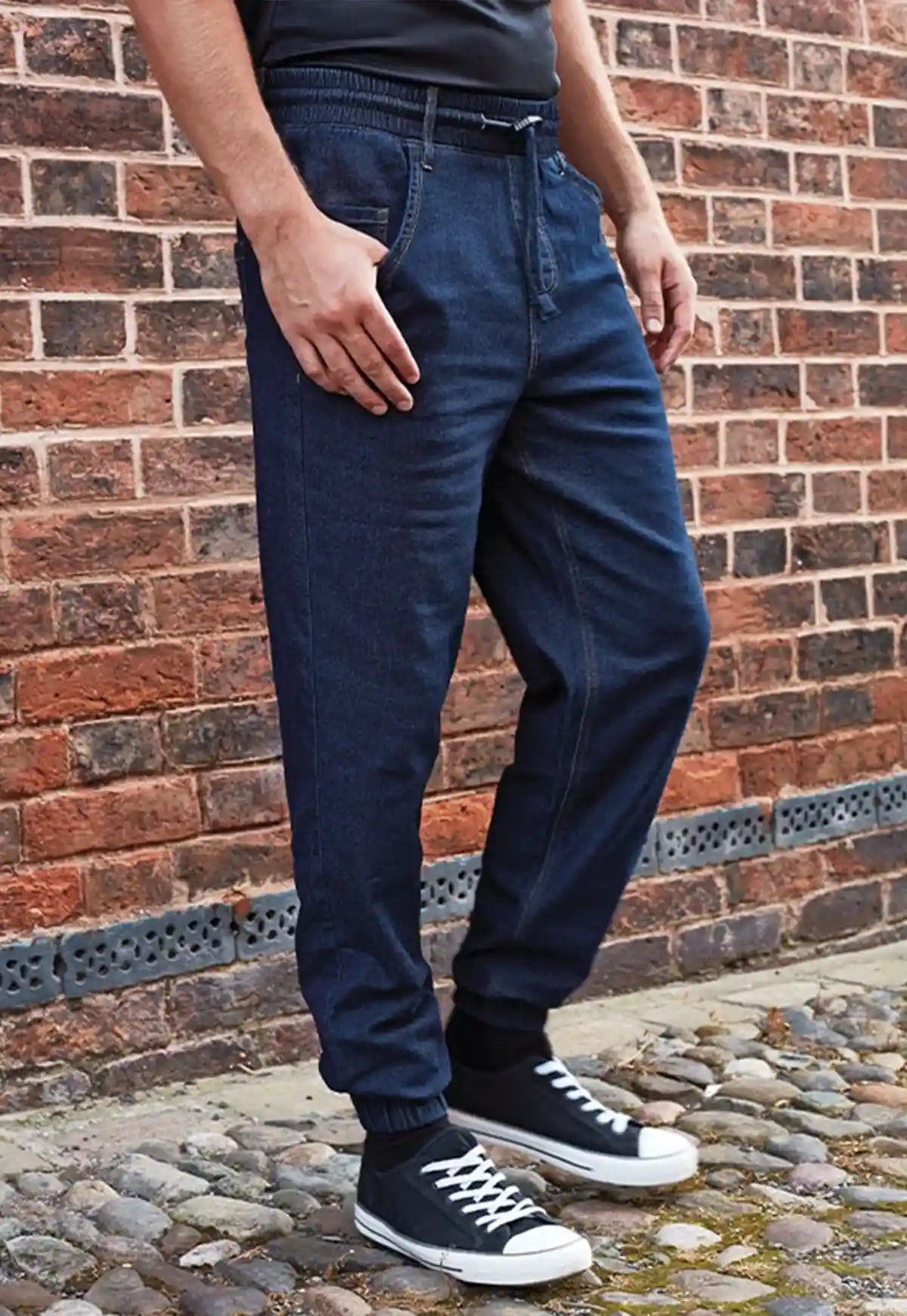 Lifestyle photo of model wearing the Chef's Artisan Jogger Bottoms PR556 in Indigo Denim.