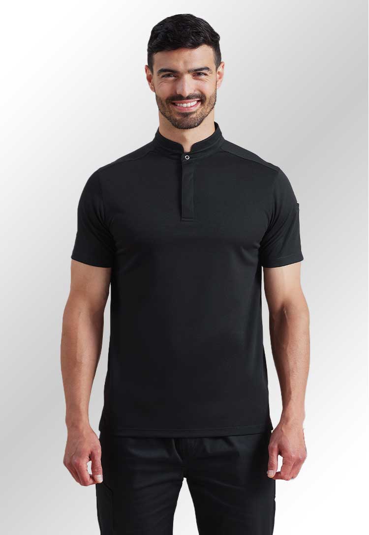 Model wearing PR646 Essential Coolchecker Short Sleeve Chef's Shirt in Black