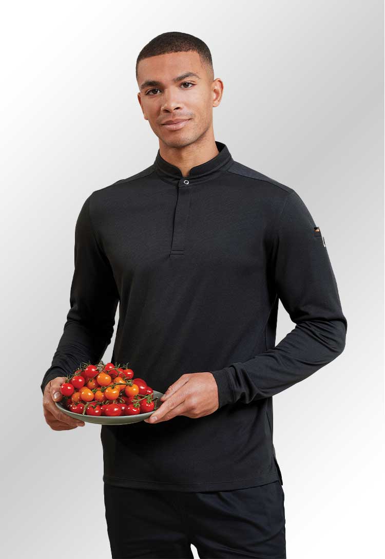 A model wearing a PR647 Essential Coolchecker long sleeve chef’s shirt in Black