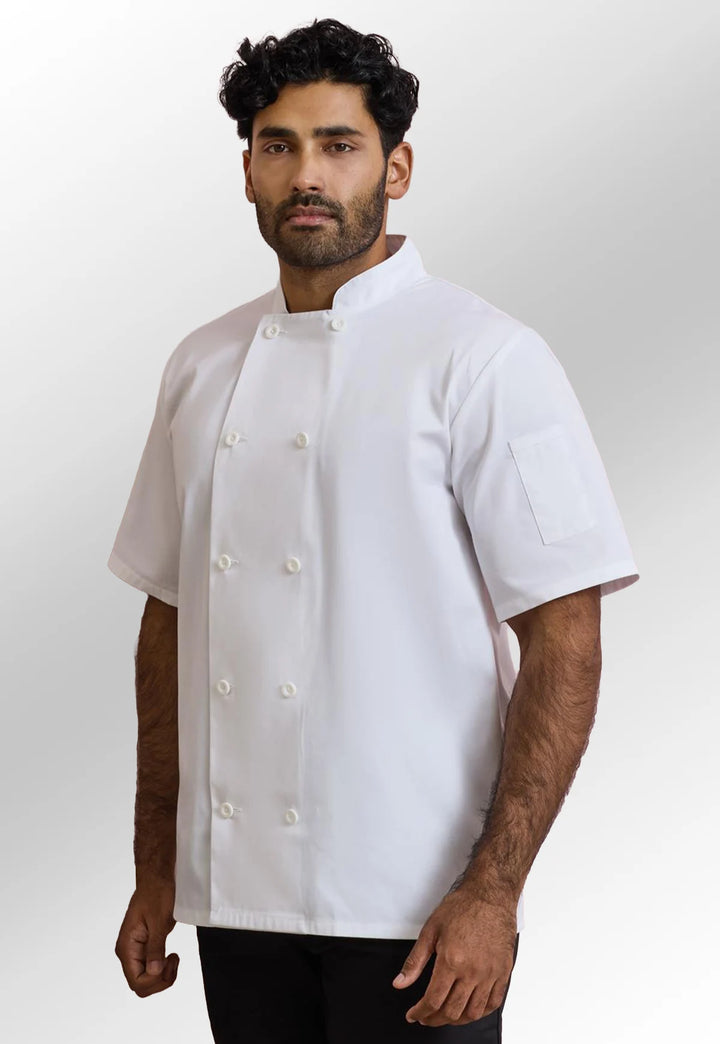 Model wearing the Premier Short Sleeve Chef's Jacket PR656 in White.