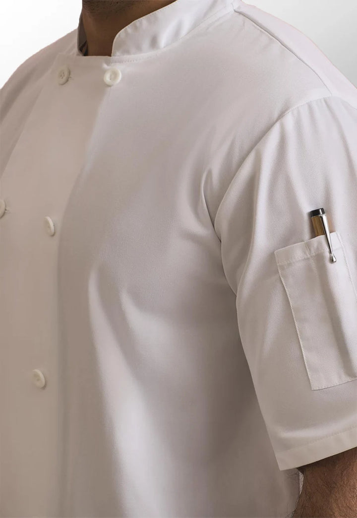 Side close-up of model wearing the Premier Short Sleeve Chef's Jacket PR656 in White.