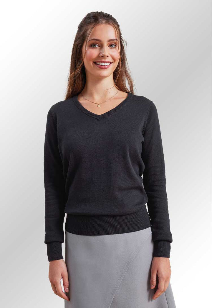 Model wearing the PR696 Women's v-neck knitted sweater in Black