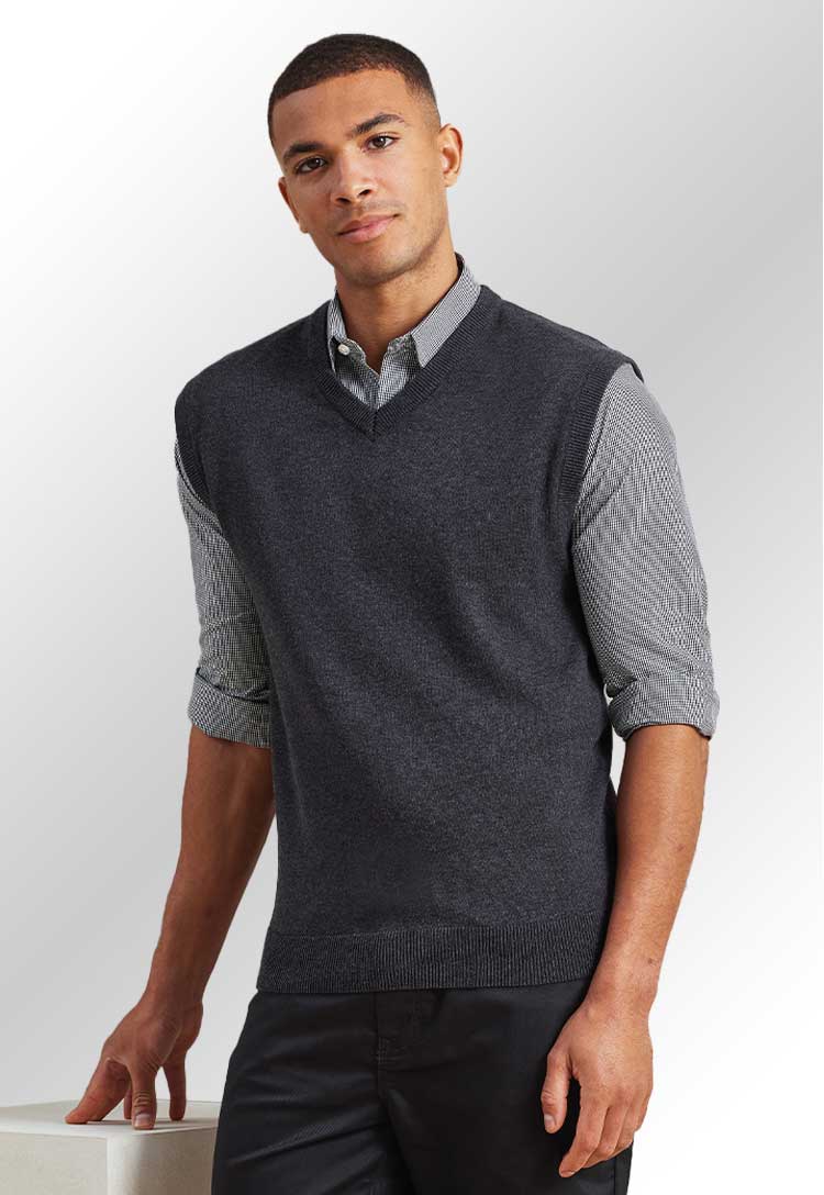 Model wearing a PR699 Sleeveless knitted sweater in Charcoal