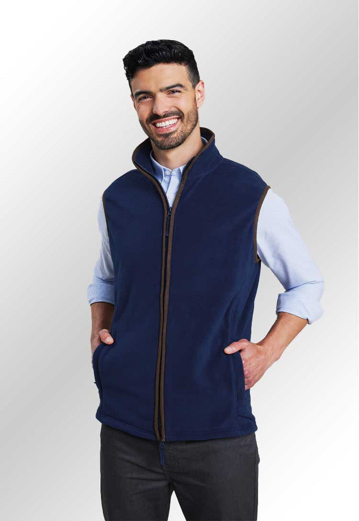 Model wearing a PR803 Artisan fleece gilet in Navy/Brown