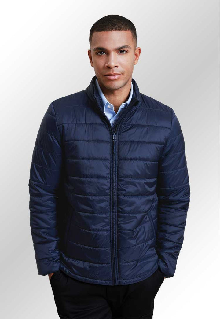 Model wearing a PR817 ‘Recyclight’ padded jacket in Navy