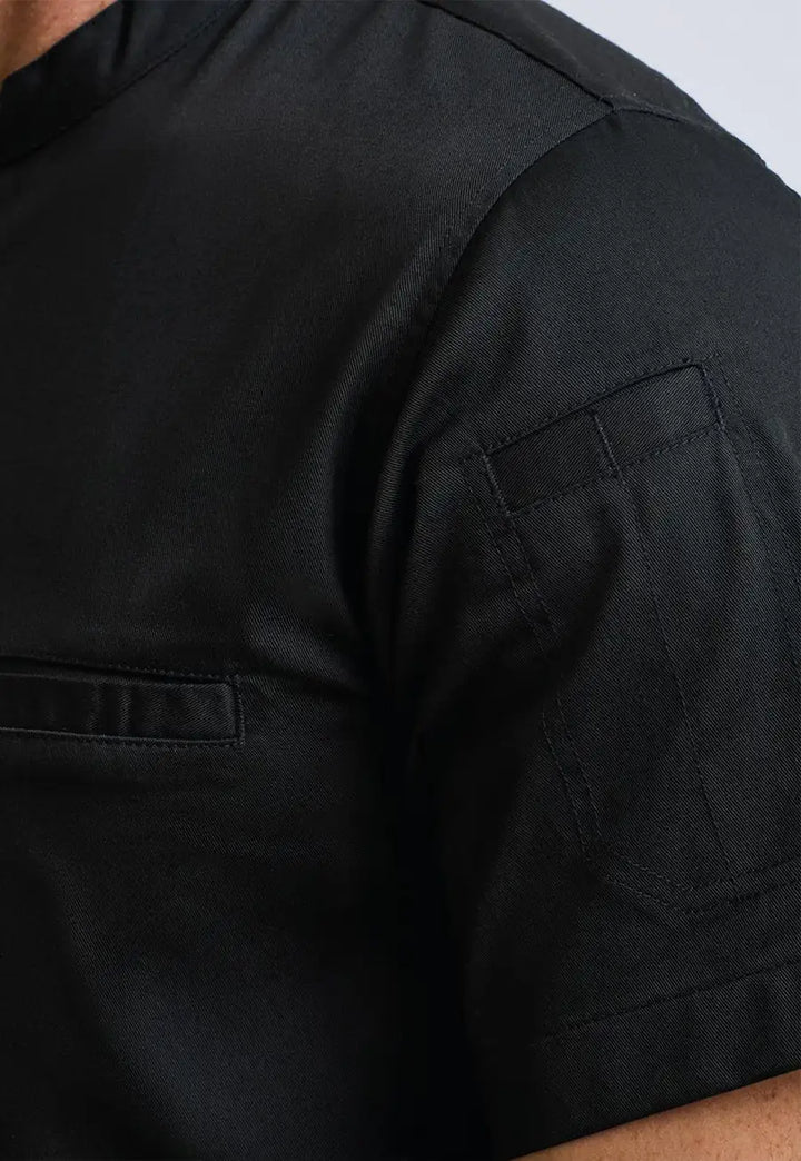 Sleeve close-up of the Premier Workwear Chef's 'Recyclight' Short Sleeve Shirt PR904 in Black.