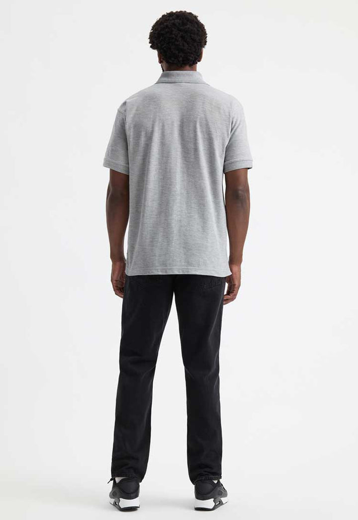 full length back view model wearing premium polo from uneek in heather grey