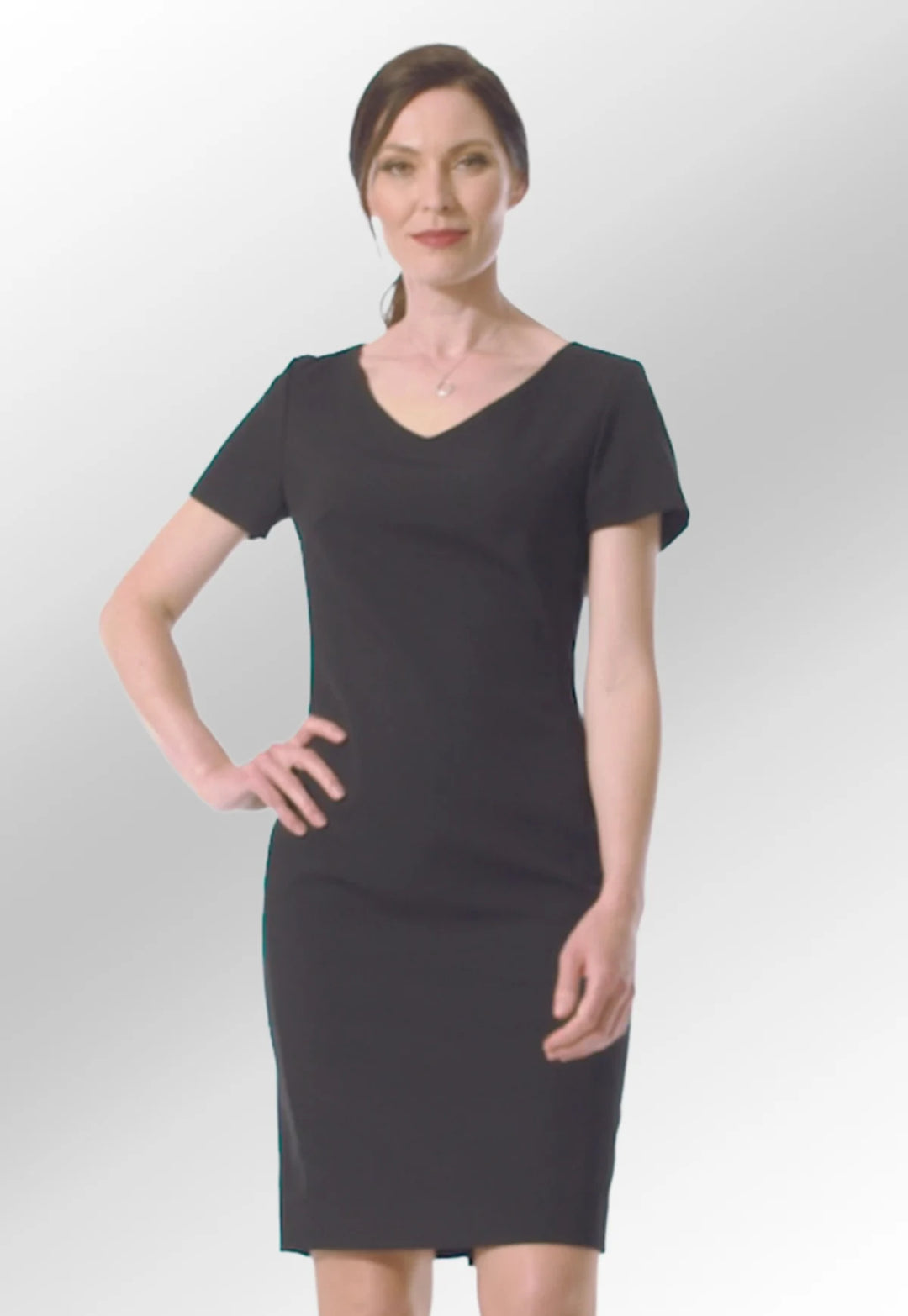 Clip of model wearing the Brook Taverner Corinthia V Neck Dress in black