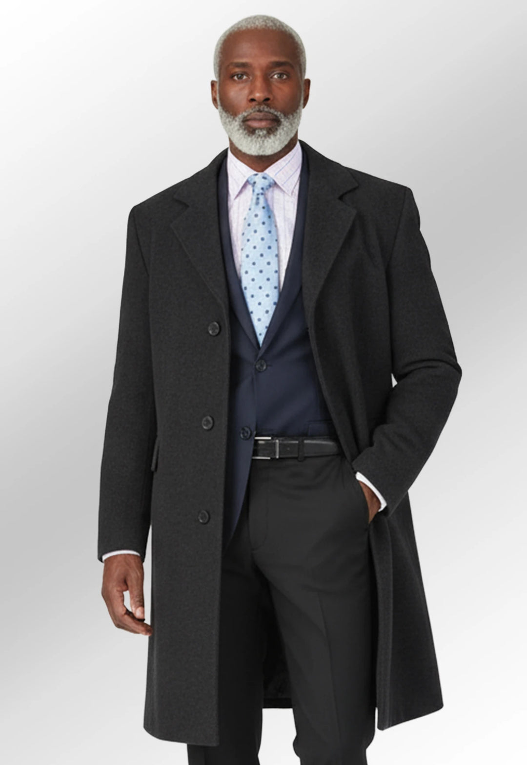 Model wearing the Burlington Black Funeral Overcoat by Brook Taverner