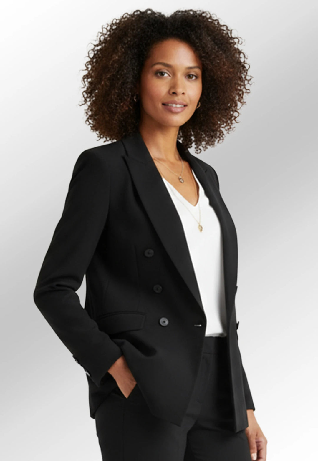 Clip of model wearing the Perdita double breasted jacket in black
