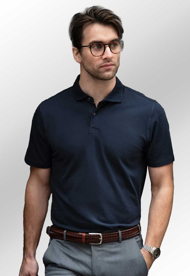 Model wearing Princeton Stretch Deluxe Cutaway Polo N124M in Dark Navy