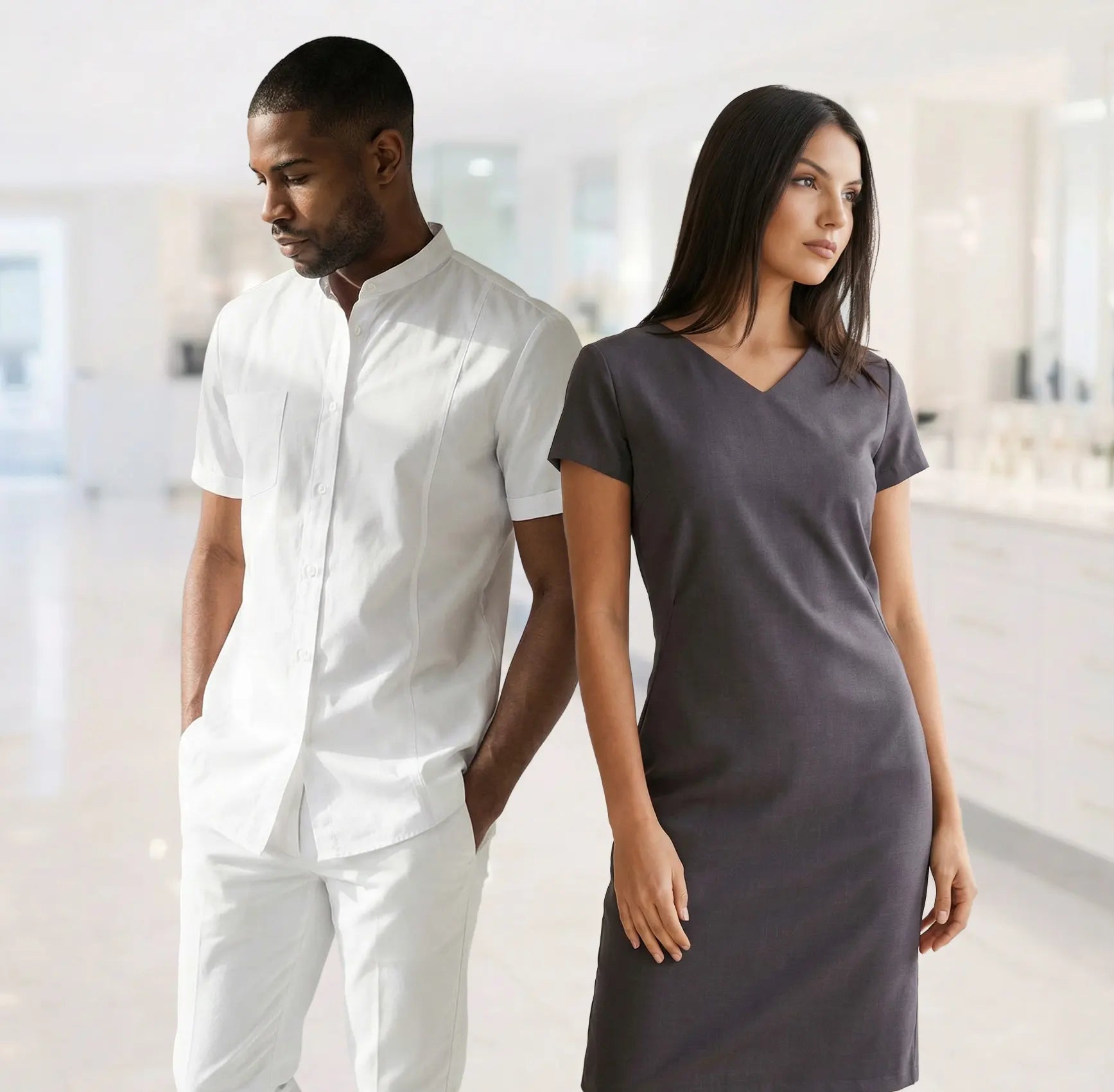 Female model wearing La Beeby Salon Dress and male model wearing white dental scrubs
