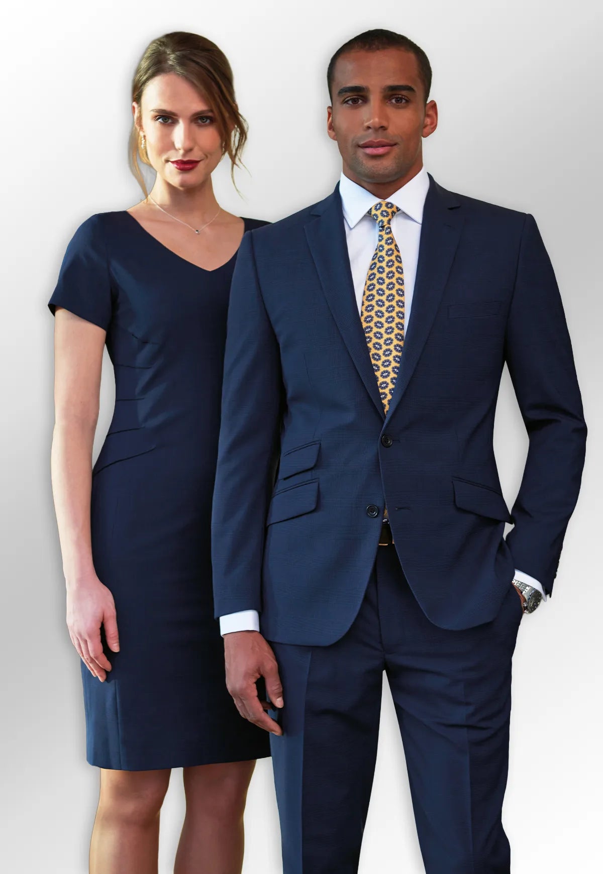 Man in suit and woman in dress from Brook Taverner Signature Collection