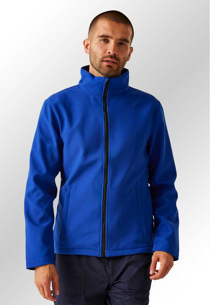 Model wearing SN130 Ablaze Printable Softshell in Royal