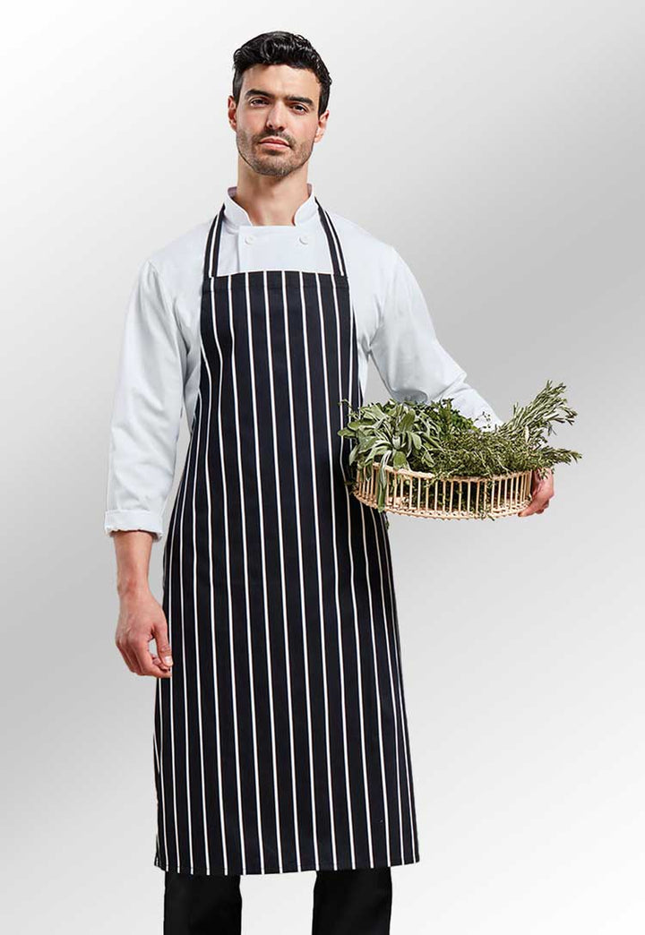 Model Wearing Striped Bib Apron PR110 in Black/White Stripe