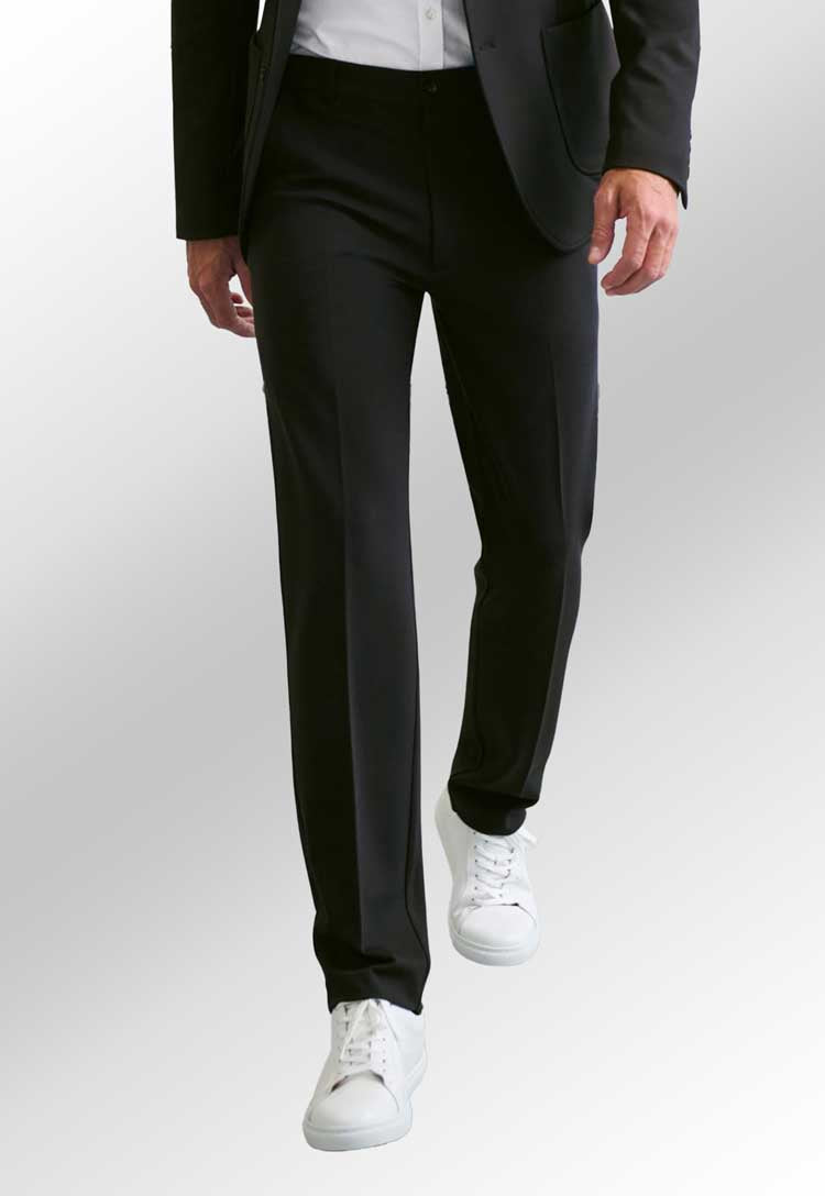 Model wearing Taurus Jersey Stretch Trouser 8026 in black