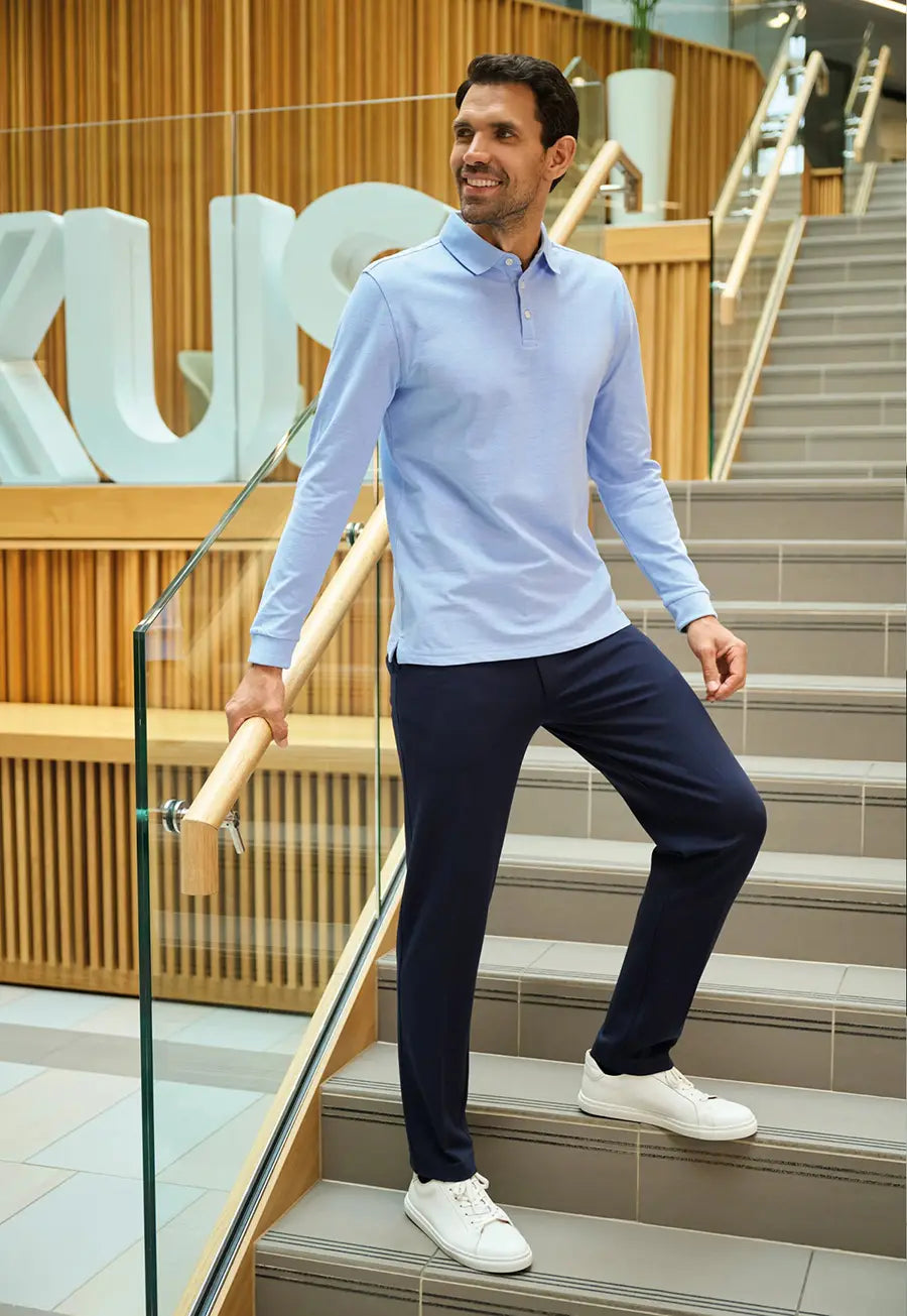 Model wearing the Brook Taverner Taurus Jersey Stretch Men's Trousers in Navy.