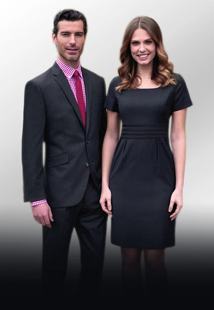 Man in a suit and woman in a black dress from Brook Taverner's 'Today' Collection