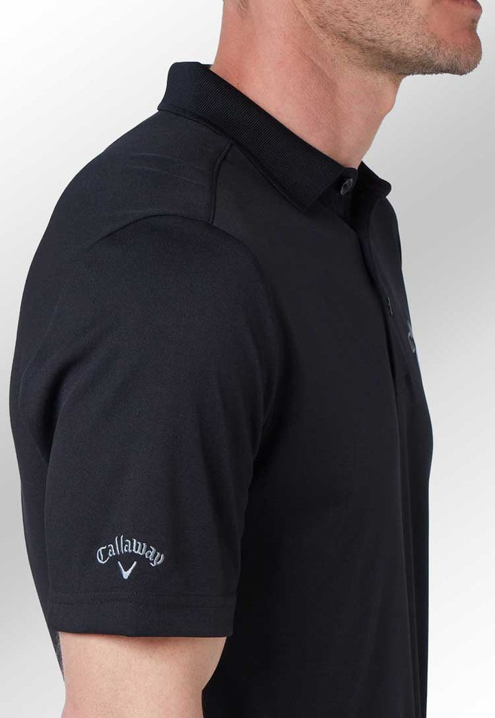 Tournament Polo CW032 in caviar worn by model sleeve logo