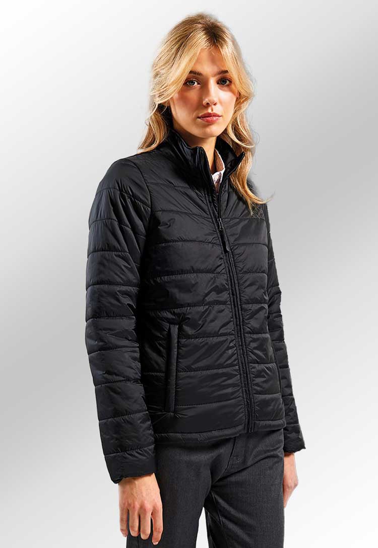 Model wearing Women’s ‘Recyclight’ Padded Jacket PR819 in black 1