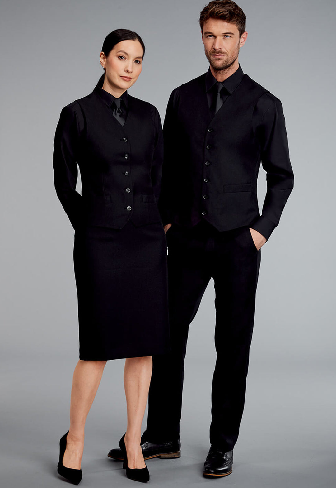 Model Wearing Hospitality Ladies Skirt in Black with Shirt and Waistcoat