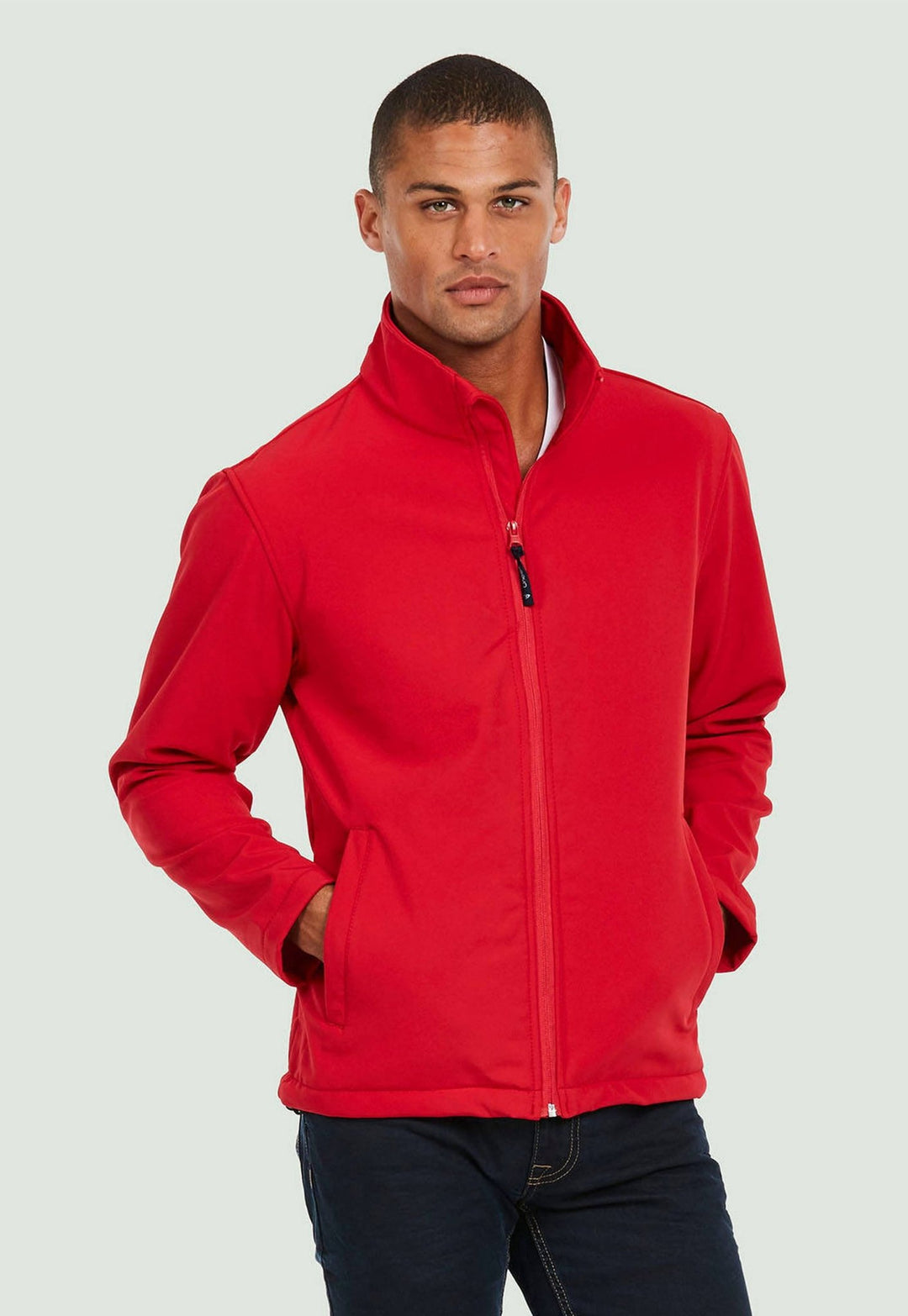 Model Wearing UC612 Classic Full Zip Soft Shell Jacket in Red