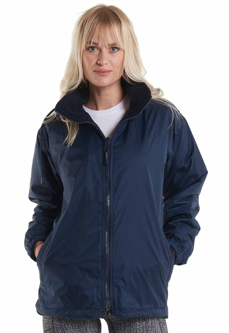 Model Wearing Premium Reversible Fleece Jacket UC605 in Navy